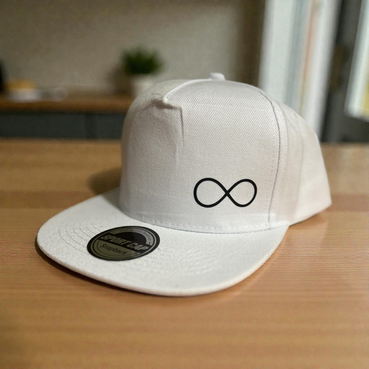 White Beyond snapback cap with infinity logo